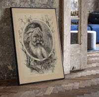 Bearded Santa Claus head in oval print in a black frame leaning beside a vintage door on parquet