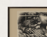 Close-up of the Santa Claus watching a sleeping child print's dark wood frame corner and archival matte paper