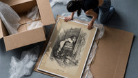 Boy hiding face beside fireplace framed print being unpacked from protective bubble wrap and a box