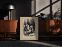Black-framed Two children waiting up on Christmas Eve print on a moody console with designer coffee-table books