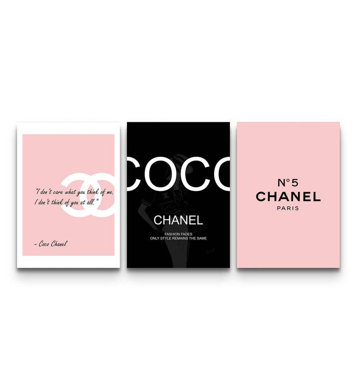 Trio of pink and black Chanel fashion posters showing CC logo, COCO lettering, and N°5 branding on a wall