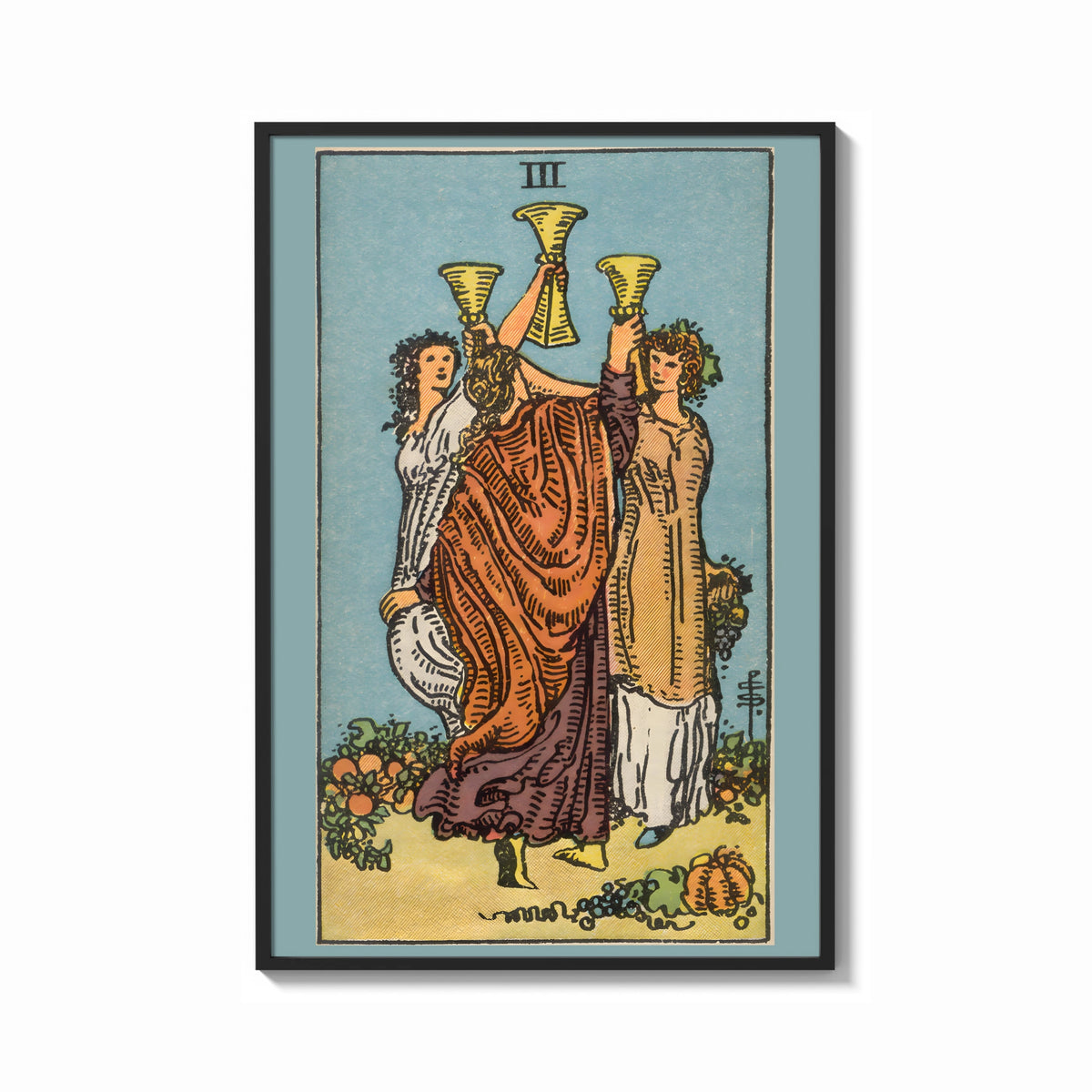 Framed Three of Cups print shown as a bold statement piece on a clean gallery wall