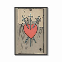 Framed Three of Swords print shown as a bold statement piece on a clean gallery wall