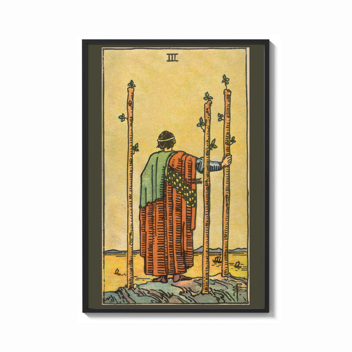 Framed Three of Wands print shown as a bold statement piece on a clean gallery wall