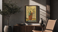 Three of Wands poster framed above a fluted sideboard beside a potted tree
