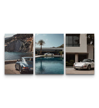 Three Porsche 911 coastal posters on a warm backdrop beside a crush-resistant shipping tube