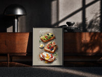 Black-framed Three Toasts with Egg, Avocado and Fig print on the floor in front of a dark wooden console