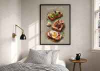 Three Toasts with Egg, Avocado and Fig print in a black frame above a bed with striped linens