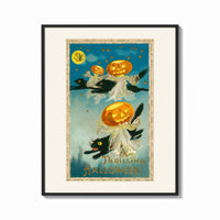 Framed Black cats with jack-o-lantern heads print shown as a bold statement piece on a clean gallery wall