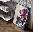 Tony Tony Chopper anime character poster in a black frame leaning beside a shelf in a raw-plaster loft