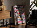 Walnut-framed Tony Tony Chopper anime character print leaning against a sunlit rustic brick wall
