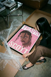 Travis Scott Cactus Jack Portrait poster rolled beside its crush-resistant shipping tube