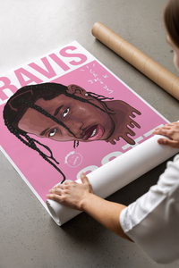 Hands unrolling a pink Travis Scott Cactus Jack Portrait poster on concrete floor with cardboard tube nearby