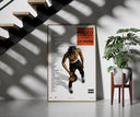 Travis Scott Rodeo Anniversary framed print on a staircase entryway wall beside a plant