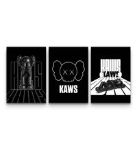 Trio of black KAWS prints showing outline companion figure, skull head motif and vanishing perspective typography