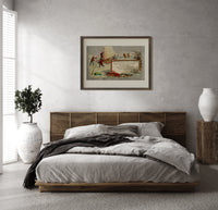 Children ice fishing beside an ice boat print in a dark wood frame above a rattan bed on a plaster wall