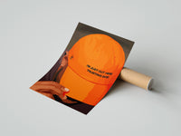 Gently curled Trusting God Orange Cap print beside its protective shipping tube