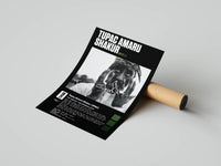 Close-up Tupac Shakur portrait with olive green accents unrolled across a kraft mailing tube