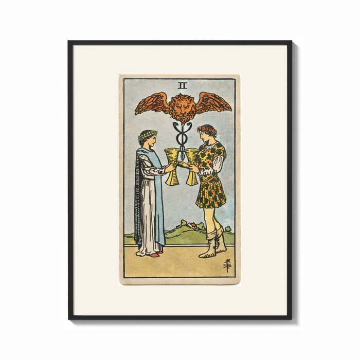 Framed Two people toasting golden cups print shown as a bold statement piece on a clean gallery wall