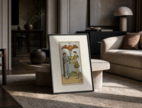 Two people toasting golden cups print in a black frame leaning on a travertine table in a sunlit lounge