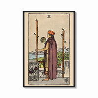 Framed Two of Wands print shown as a bold statement piece on a clean gallery wall