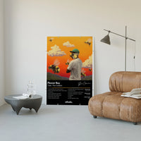 Tyler the Creator Flower Boy Tracklist poster framed above a tan leather living-room couch