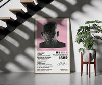 Tyler the Creator IGOR framed print on a staircase entryway wall beside a plant