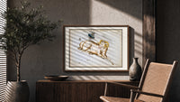 Aries ram and fly constellation chart print in a wood frame above a fluted sideboard beside an olive tree
