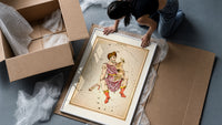 Auriga constellation charioteer holding goat framed print being unpacked from protective bubble wrap and a box