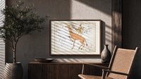 Camelopardalis constellation giraffe with figures print in a wood frame above a fluted sideboard beside an olive tree