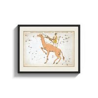 Framed Camelopardalis constellation giraffe with figures print shown as a wide statement piece on a clean white wall
