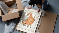 Cancer crab zodiac constellation illustration framed print being unpacked from protective bubble wrap and a box