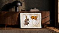 Canis Major, Lepus, Columba constellations chart print in a black frame leaning against a walnut console in lamplight