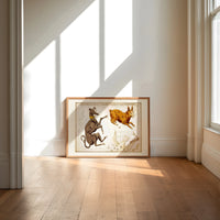 Canis Major, Lepus, Columba constellations chart print in an oak frame on a sunlit wood floor beneath tall window light