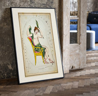 Cassiopeia constellation seated woman figure print in a black frame leaning beside a vintage door on parquet