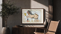 Cetus the whale constellation chart print in a wood frame above a fluted sideboard beside an olive tree