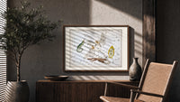 Celestial constellation star chart with animals print in a wood frame above a fluted sideboard beside an olive tree