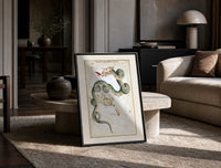 Draco dragon and Ursa Minor bear constellations print in a black frame leaning on a travertine table in a sunlit lounge