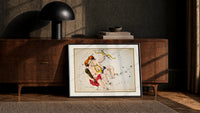Gemini twins constellation figures with lyre print in a black frame leaning against a walnut console in lamplight