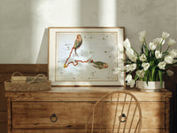 Pisces constellation with two fish print in an oak frame on a farmhouse dresser beside white tulips