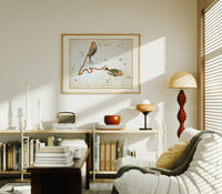 Pisces constellation with two fish print in an oak frame above a mid-century book console with a vintage radio