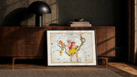 Ophiuchus serpent bearer star chart print in a black frame leaning against a walnut console in lamplight