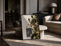 Usopp aiming slingshot in action print in a black frame leaning on a travertine table in a sunlit lounge