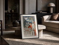 Elegant couple viewing spa resort print in a black frame leaning on a travertine table in a sunlit lounge