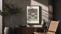 French railway travel timetable poster framed above a fluted sideboard beside an olive tree