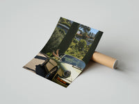Gently curled Vintage Green 911 Targa at the Villa print beside its protective shipping tube