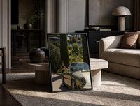 Vintage Green 911 Targa at the Villa print on the floor, leaning against a travertine table