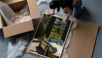 Vintage Green 911 Targa at the Villa framed print being unpacked from protective bubble wrap and a box
