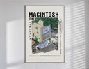 Vintage Macintosh computer with plants poster in a slim frame on a bright wall with soft window light