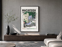 Vintage Macintosh computer with plants poster framed above a wood console in a concrete-wall living room